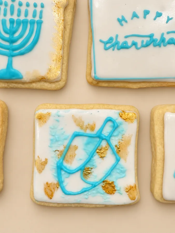Chanukah menorah and dreidel plaques, close up