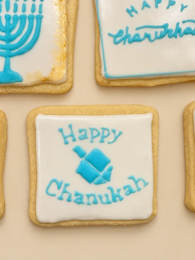 Chanukah menorah and Happy Chanukah plaques