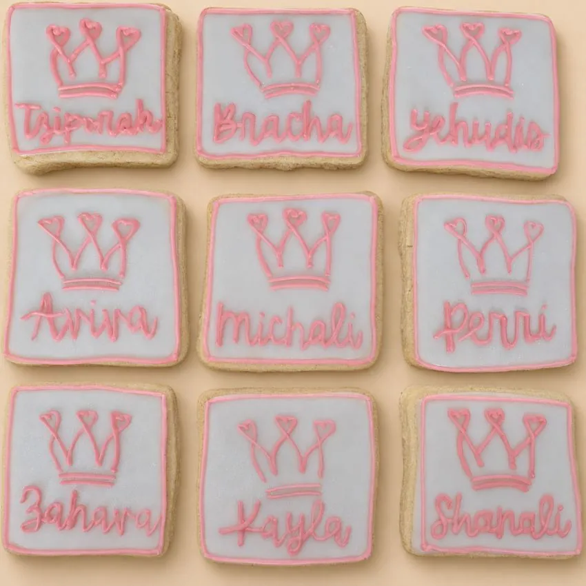 Cream and teal 21st birthday cookies, close up angle