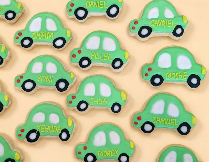 Green car cookies personalized with boys' names