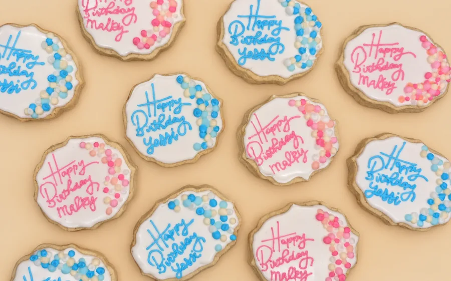 Happy Birthday Yossi and Malky plaque cookies